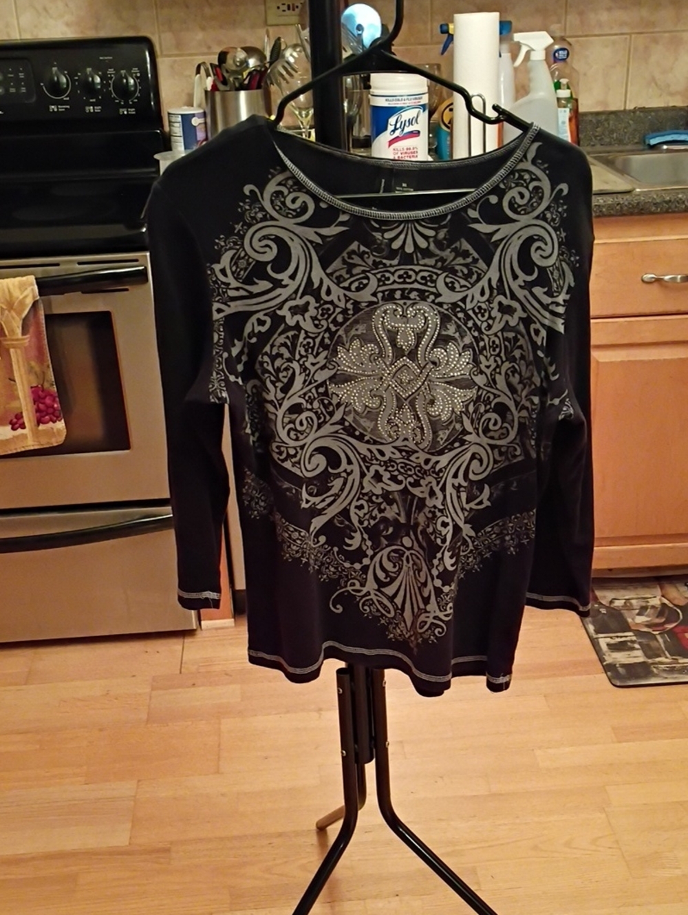new directions Black Long Sleeve Tee with Silver Medallion Design